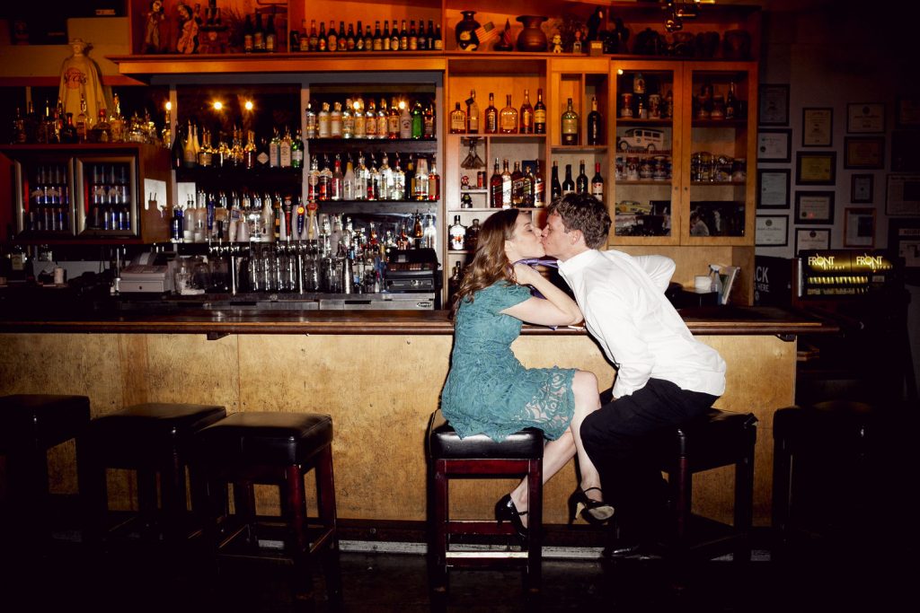 Engagement photo in a bar