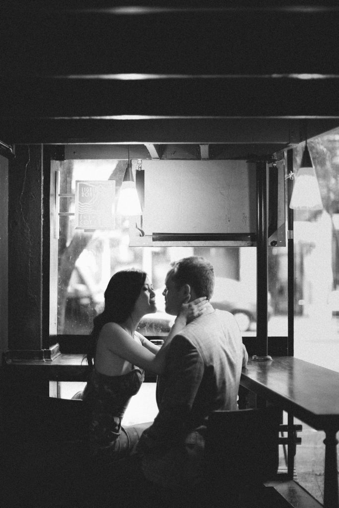 Engagement photo at the bar in Seattle, Washington