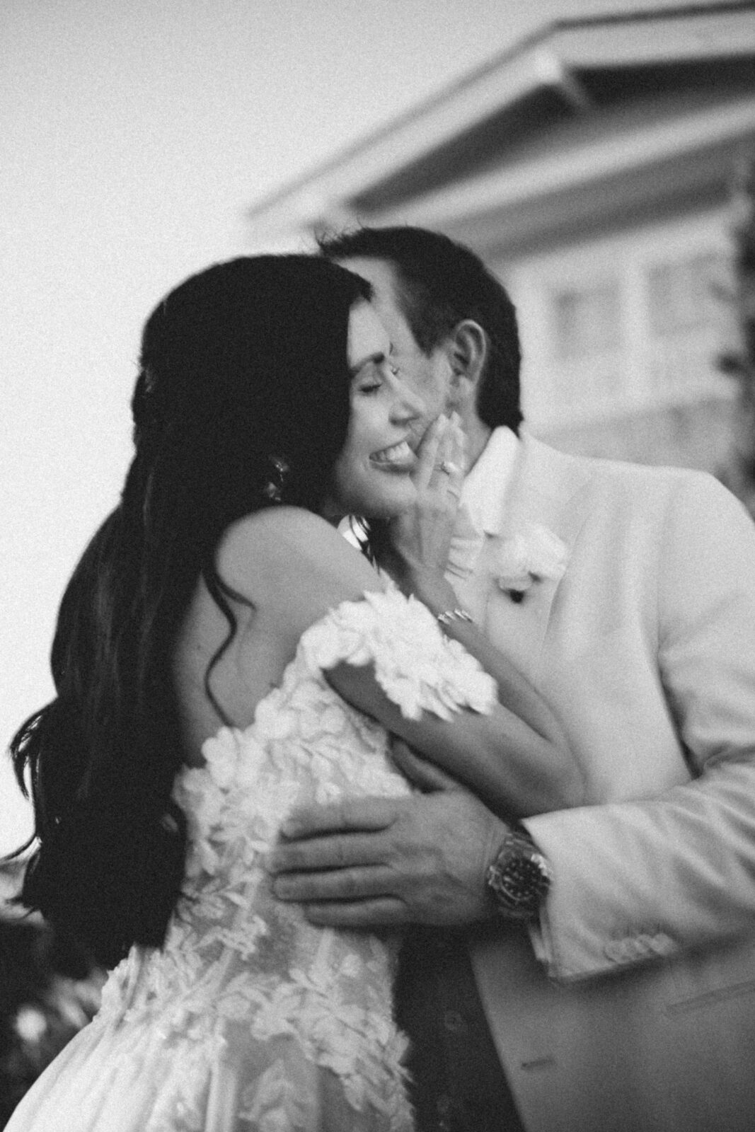 Bride and groom laughing